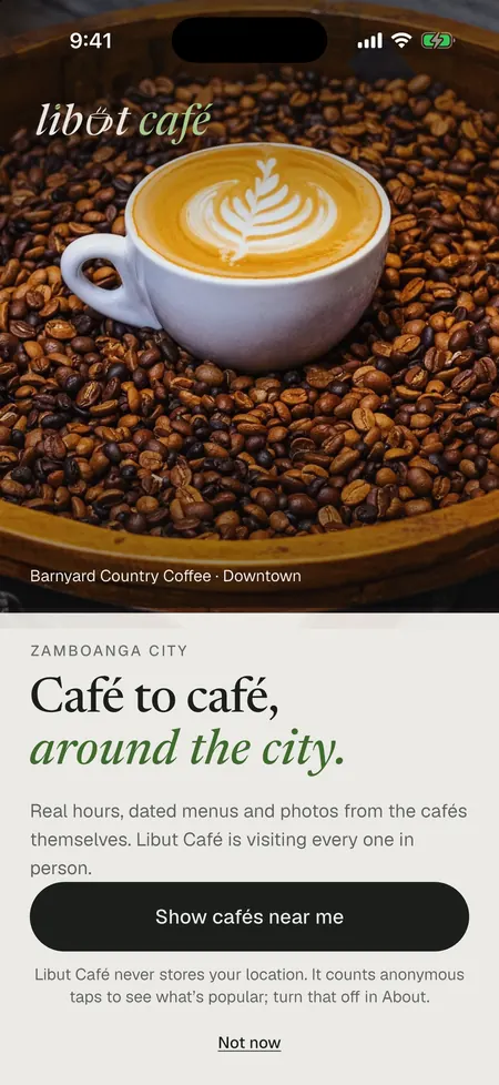The first-launch welcome screen: the Libut Café wordmark over a latte photo from Barnyard Country Coffee, “Café to café, around the city.” and a “Show cafés near me” button.